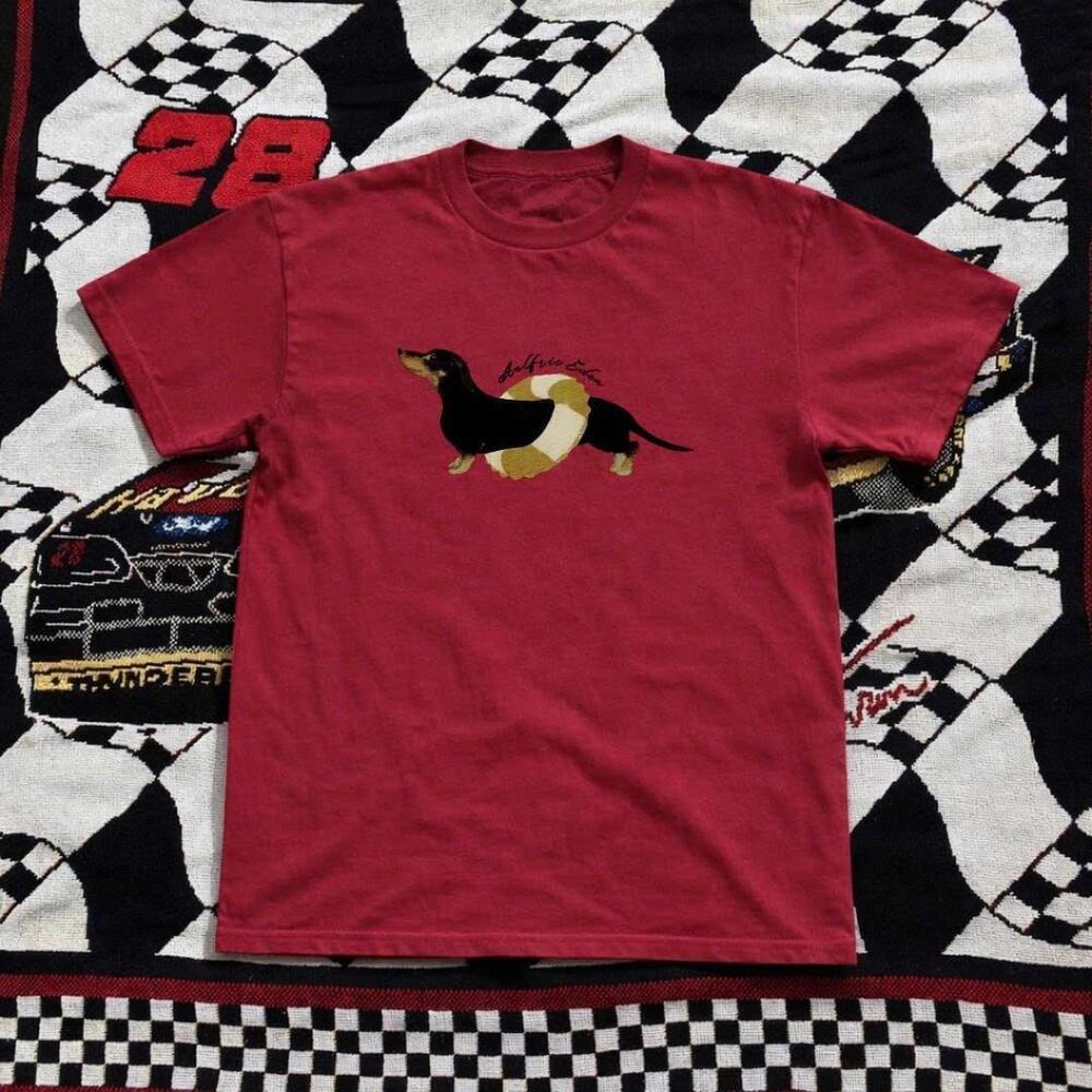 Red And Black Graphic Tee With A Unique Design